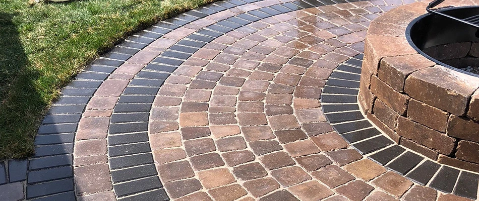 Patio and fire pit installed for landscape in Ankeny, IA.