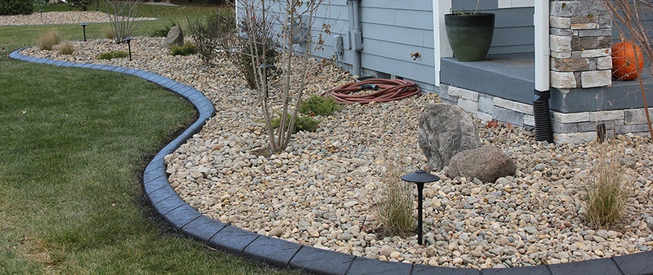 Rocks installed for landscape bed in Ankeny, IA.